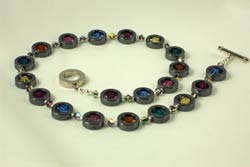 Hematite 'Donuts' filled with Swarovski cubes